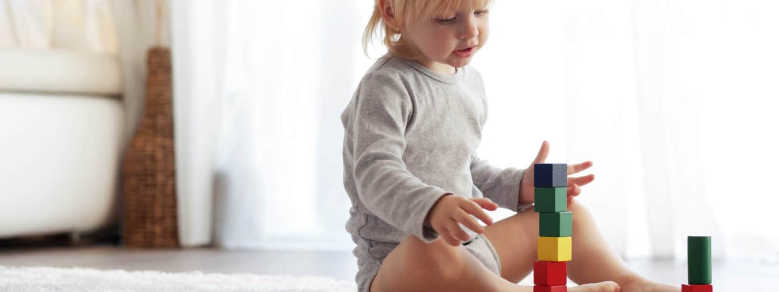 toddler playing blocks