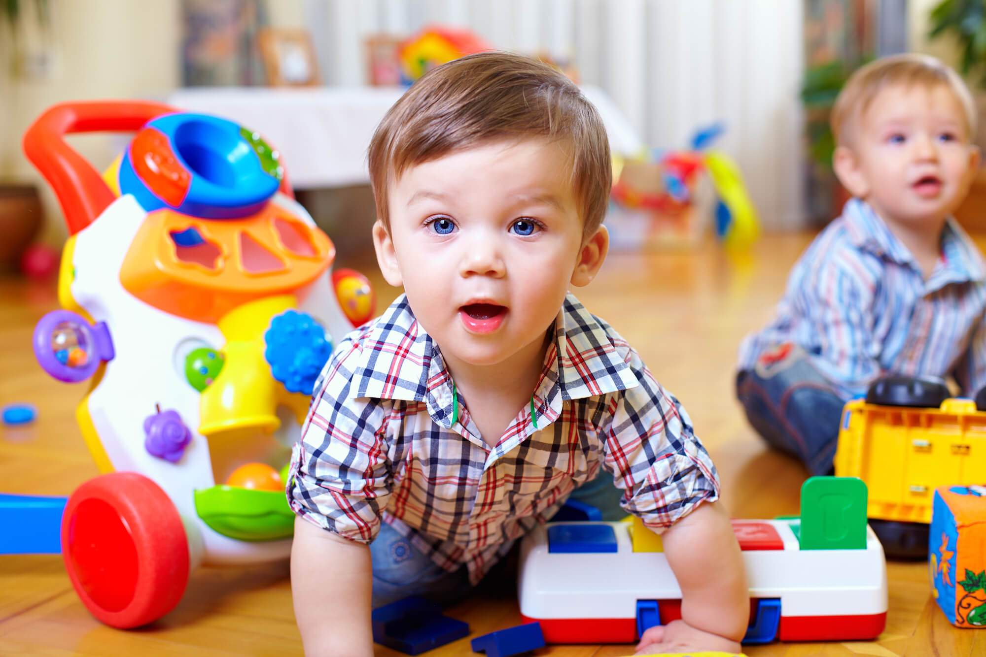 toddler boy with toys