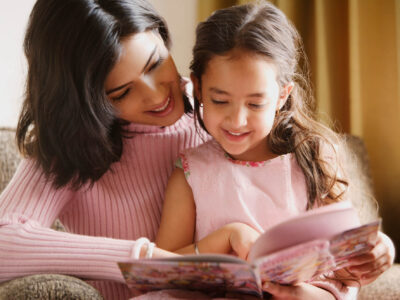 girl and mom reading