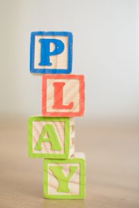 blocks spelling the word play 