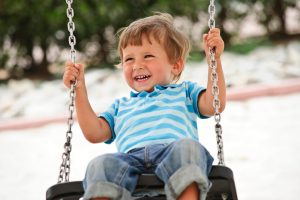 boy swinging