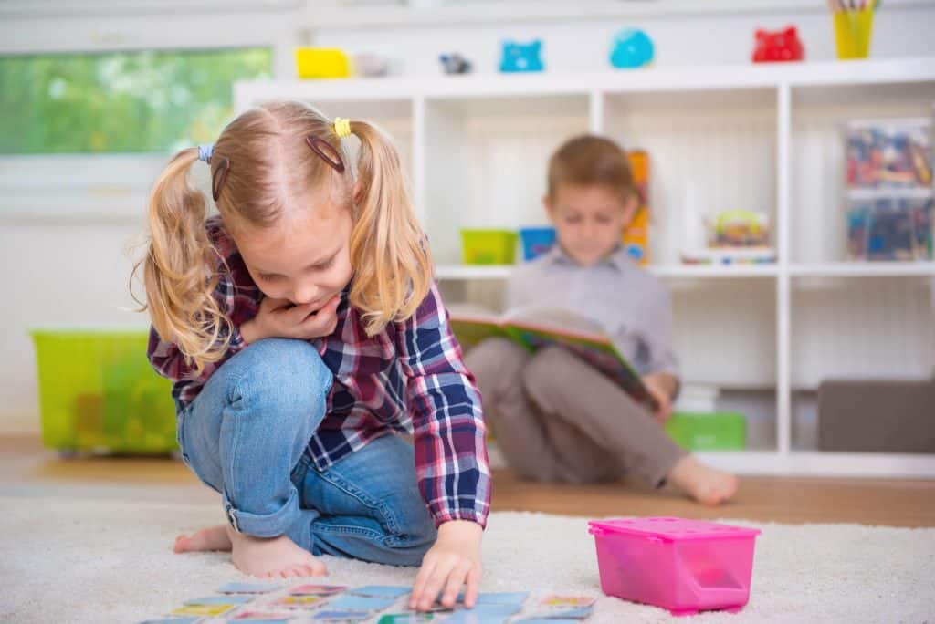 preschool girl playing memory