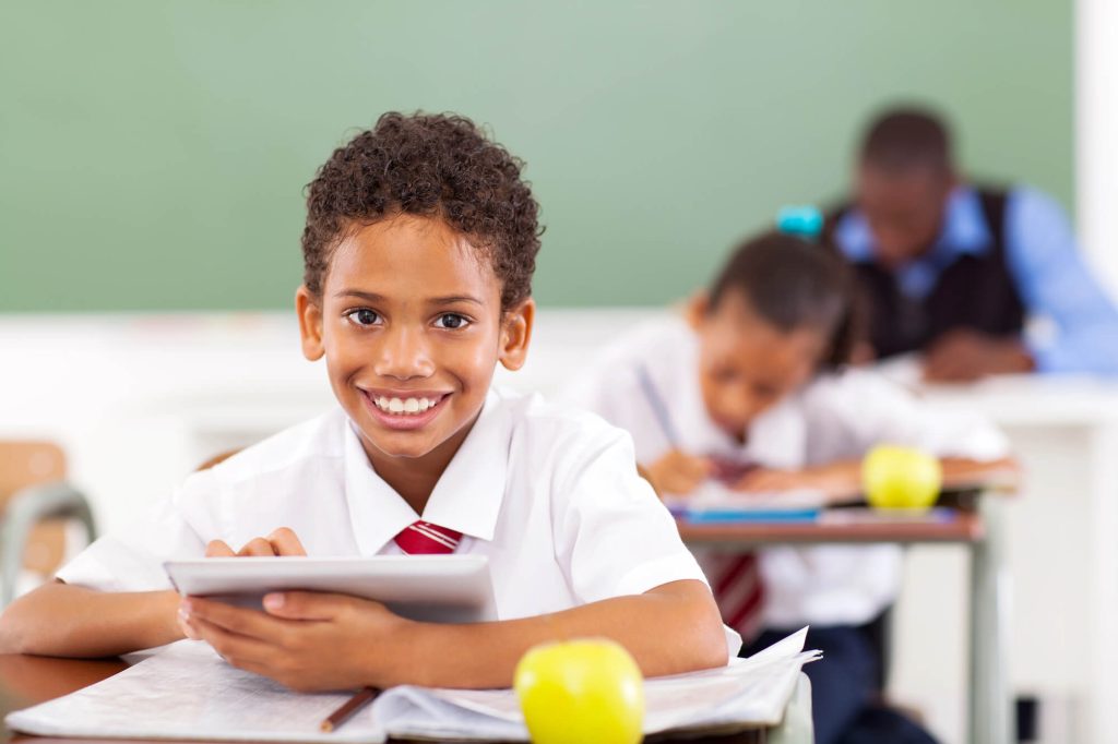 boy reading in school