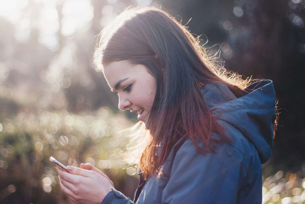 teen girl with phone