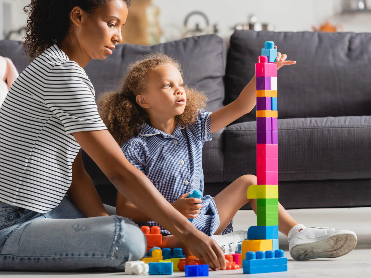 child stacking play schema
