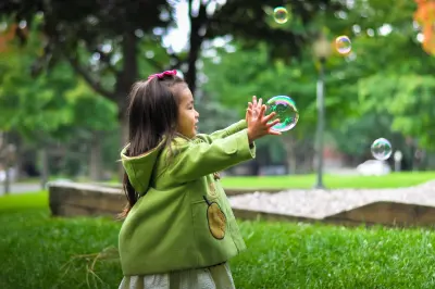 toddler with bubble child rearing