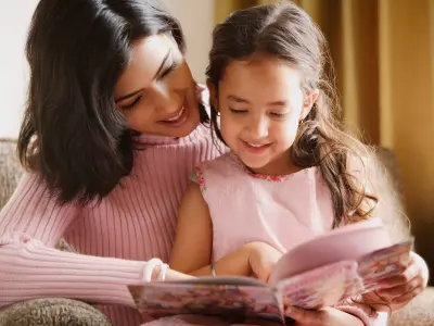 girl and mom reading