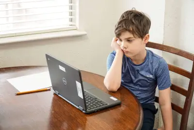 boy looking bored summer bucket list