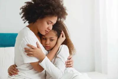 mom comforting a child 