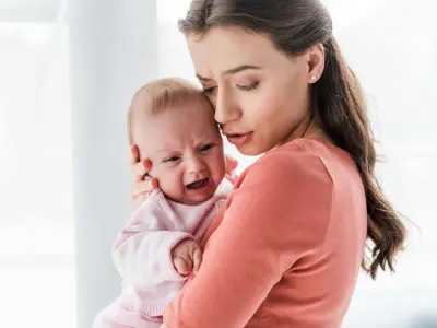 mom with crying baby