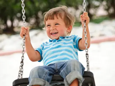 boy swinging