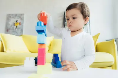 toddler playing with toys toddler toys