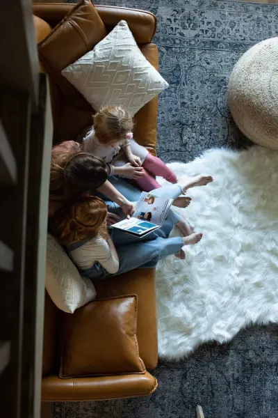 girls and mom reading